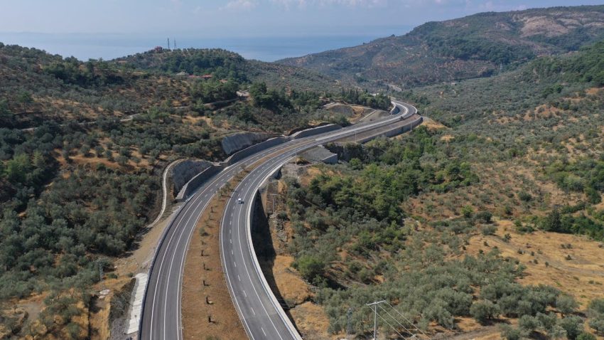 Scenic aerial shot of a winding highway through Küçükçetmi, Çanakkale, Turkey.